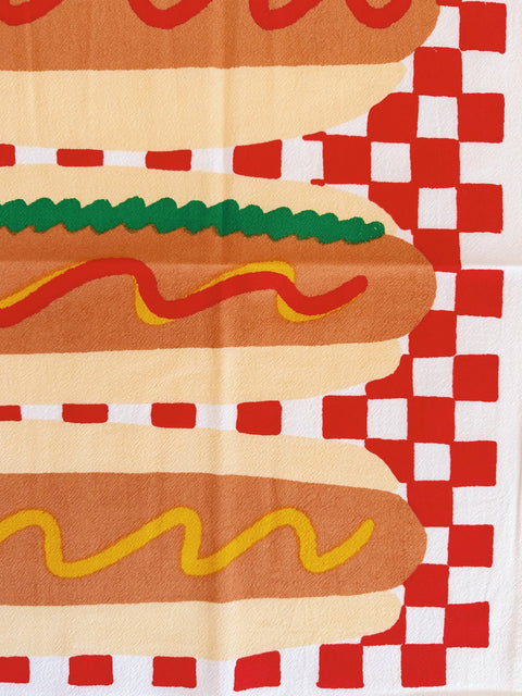 Julie Peach Hot Dog! Tea Towel